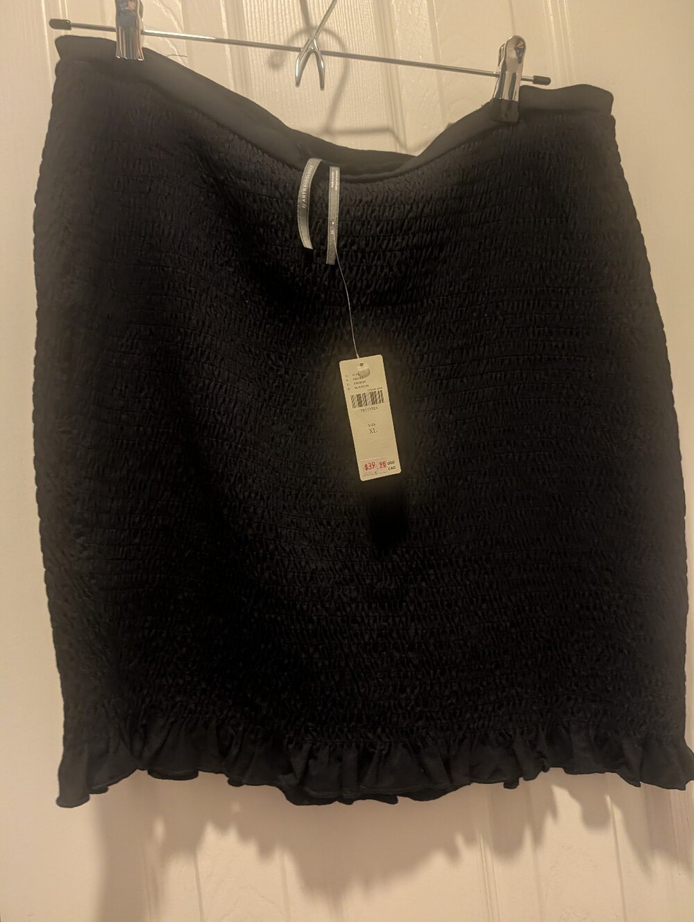 NWT Anthropologie Black Smocked Mini Skirt with Ruffle Hem